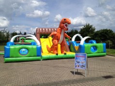 Jurrasic Park Event Modul – XXL Hüpfburg | Rutsche | Parcours