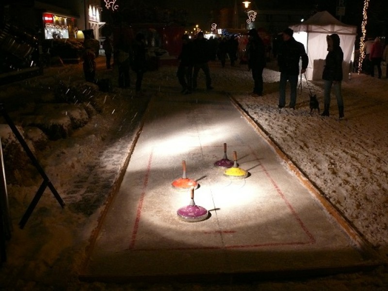 Eisstock schießen - Curling , Winter Spiele , Eisstockbahn
